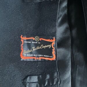 Vintagee, custom tailored black coat.